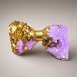 Roze en gouden pailletten haarstrik met clip